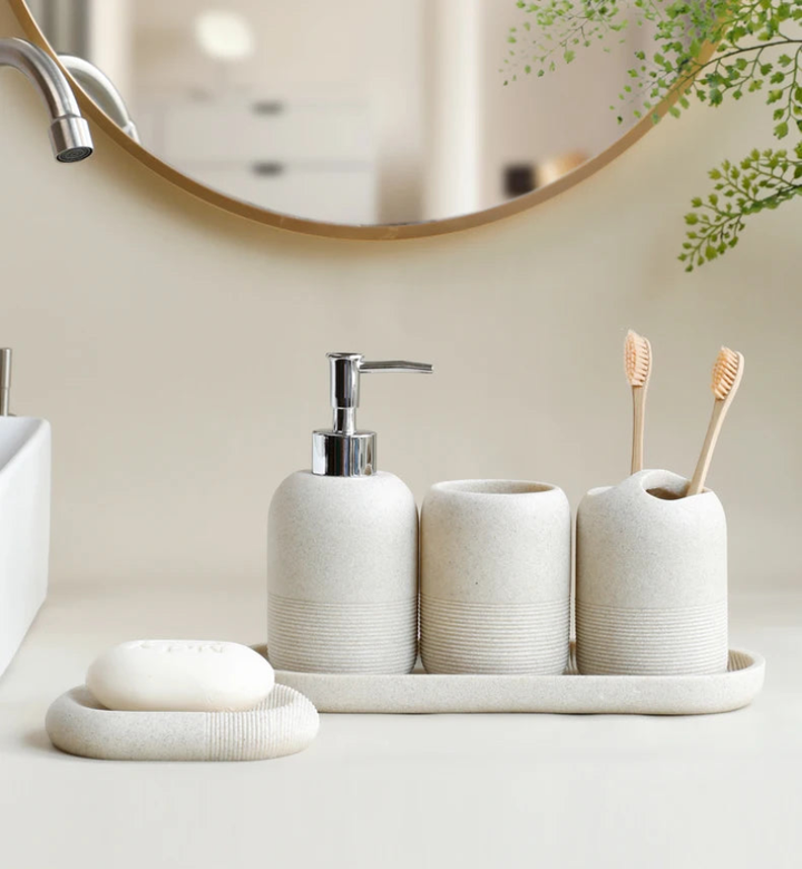 Modern Minimalist 5-Piece Beige Resin Bathroom Accessories Set with Lotion Dispenser, Toothbrush Holder, and Soap Dish 2