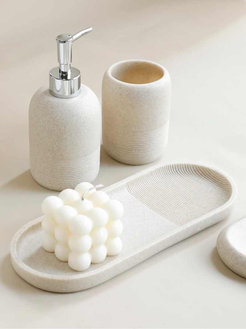 Modern Minimalist 5-Piece Beige Resin Bathroom Accessories Set with Lotion Dispenser, Toothbrush Holder, and Soap Dish 3