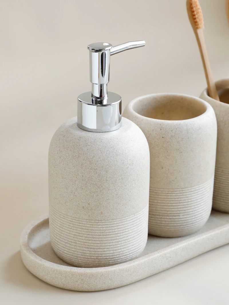 Modern Minimalist 5-Piece Beige Resin Bathroom Accessories Set with Lotion Dispenser, Toothbrush Holder, and Soap Dish 5