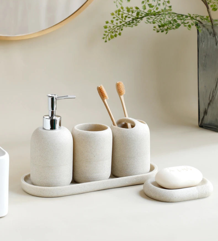 Modern Minimalist 5-Piece Beige Resin Bathroom Accessories Set with Lotion Dispenser, Toothbrush Holder, and Soap Dish 6