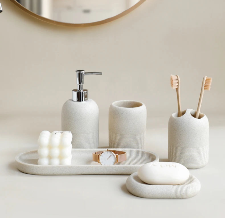Modern Minimalist 5-Piece Beige Resin Bathroom Accessories Set with Lotion Dispenser, Toothbrush Holder, and Soap Dish 7