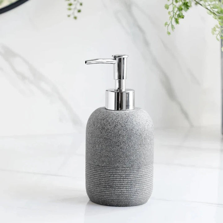 Modern Minimalist 5-Piece Beige Resin Bathroom Accessories Set with Lotion Dispenser, Toothbrush Holder, and Soap Dish 8